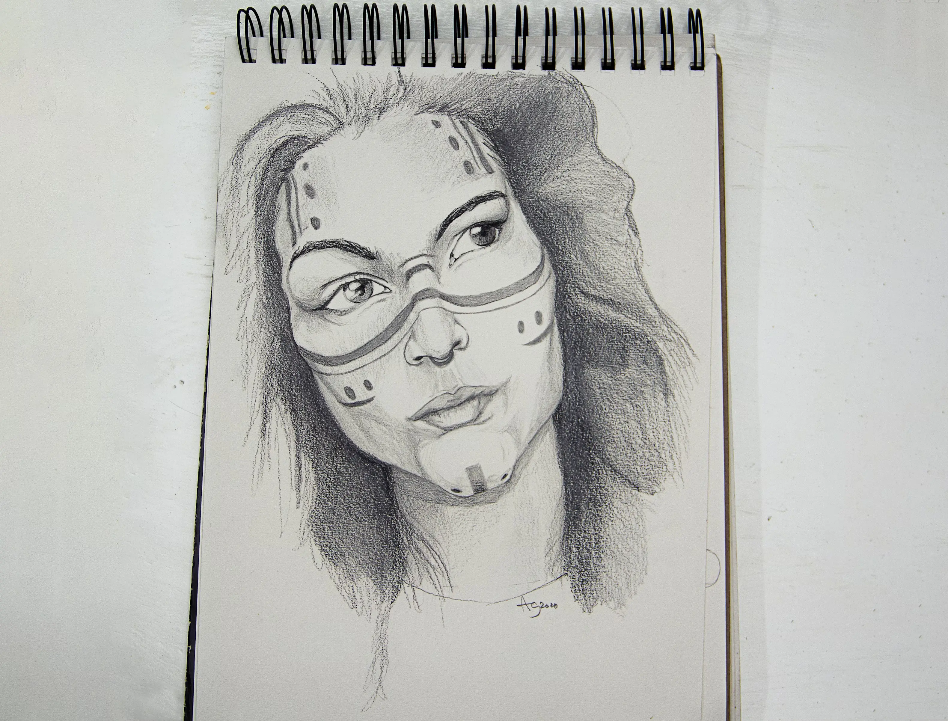 Before: Add vibrant colors to the tribal markings and hair, giving the sketch a modern twist.